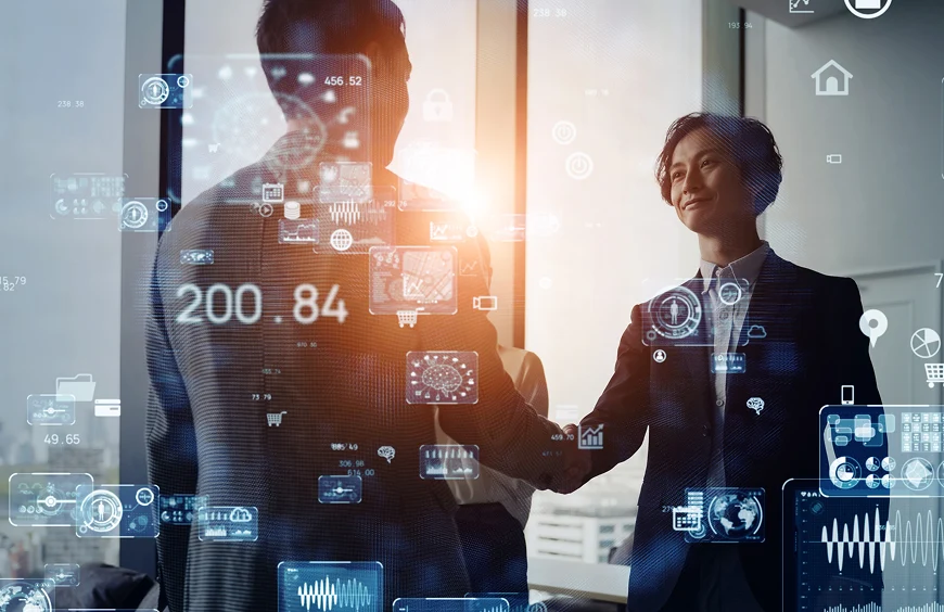 握手を交わすビジネスパーソンと、周囲に浮かぶデジタルデータが象徴する未来志向のビジネスパートナーシップ