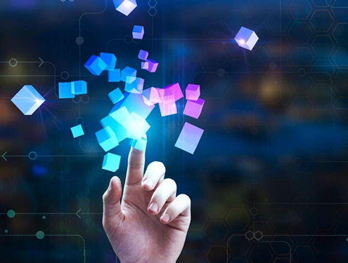 指先で浮かぶカラフルなデジタルブロックに触れる操作イメージ
